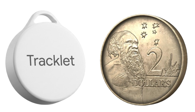Tracklet BLE tag shown next to a dollar coin - about the same size
